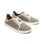 The Happy Shoe Shop Olukai Pehuea Li lace-up sneakers in Tapa Tapa textile with a collapsible heel design.