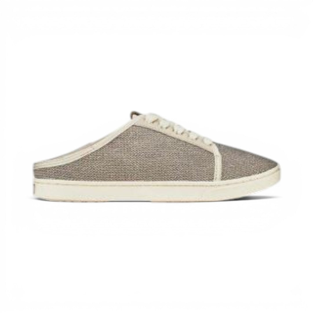 The Happy Shoe Shop Olukai Pehuea Li sneakers in Tapa Tapa textile with a collapsible heel for slip-on versatility.
