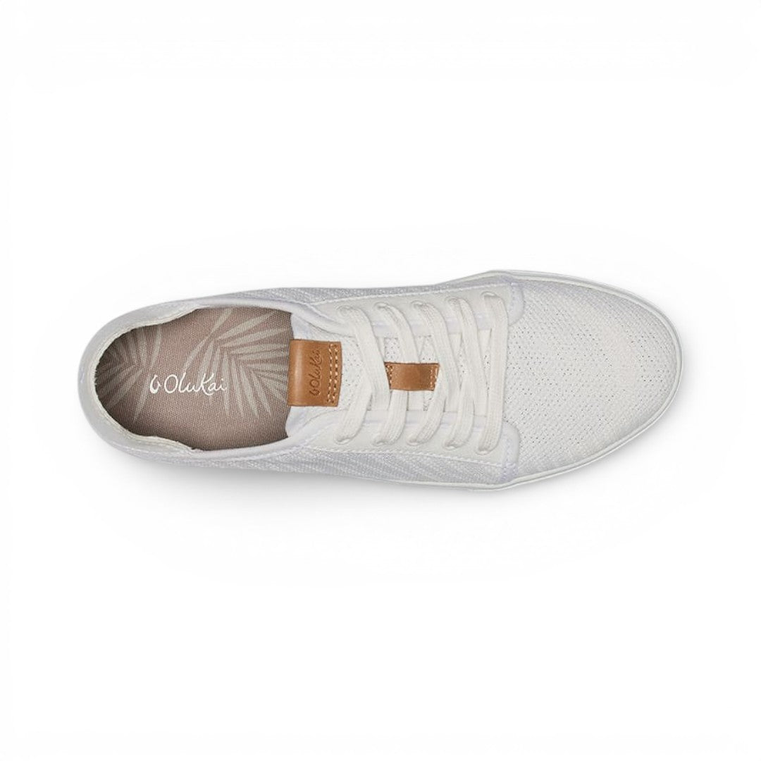 The Happy Shoe Shop Olukai Pehuea Li white mesh lace-up sneaker with tan leather accents and drop-in heel design.