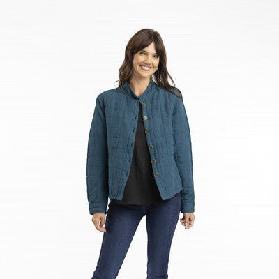 The Happy Shoe Shop Orientique Escape teal blue quilted linen padded coat worn by a woman with jeans and boots