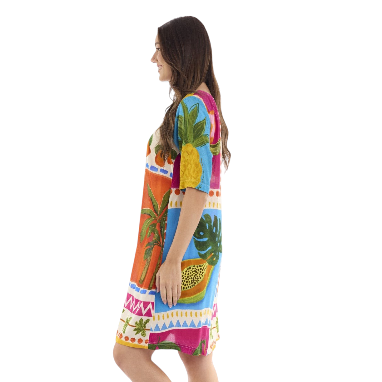 The Happy Shoe Shop Orientique Escape dress in a vibrant tropical print with elbow-length sleeves and side pockets.