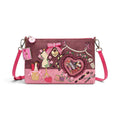 The Happy Shoe Shop Vendula London sewing box scrapbook bag in pink vegan leather with detailed sewing embroidery.