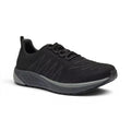 The Happy Shoe Shop Propet Mens Tour Knit Walker black knit athletic shoe with padded collar and EVA midsole.