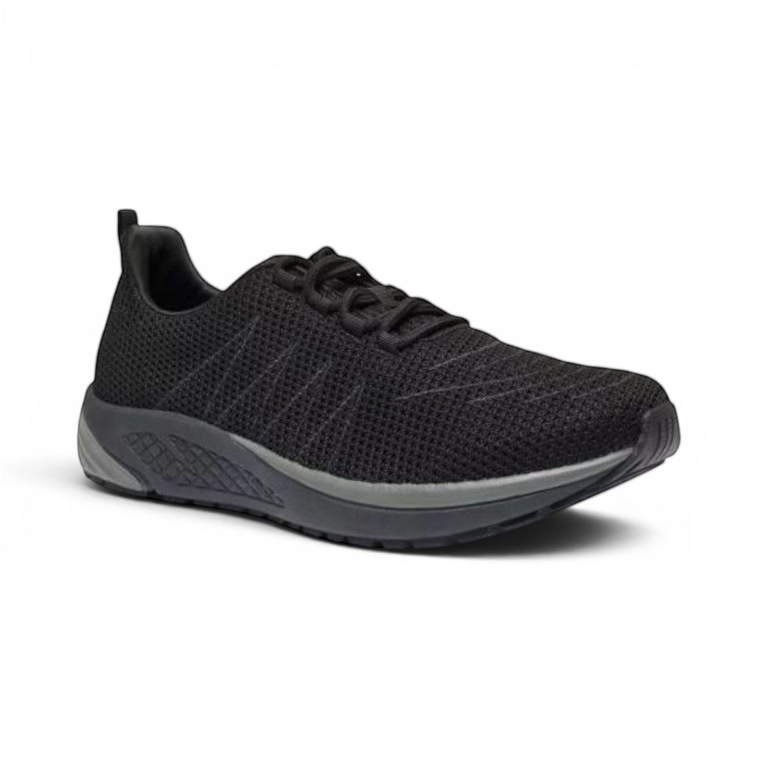 The Happy Shoe Shop Propet Mens Tour Knit Walker black knit athletic shoe with padded collar and EVA midsole.