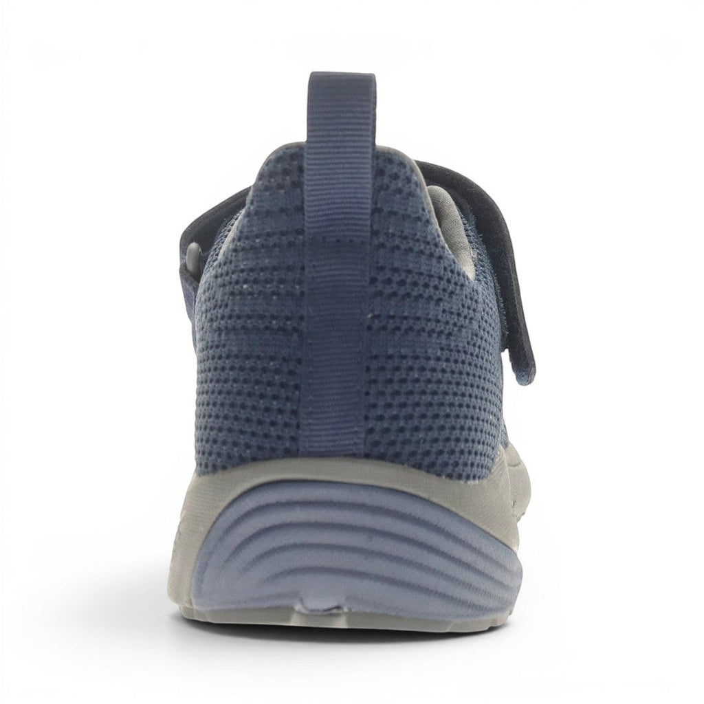 The Happy Shoe Shop Propet Men's Tour Knit FX navy blue knit sneakers with Velcro strap and pull tab.