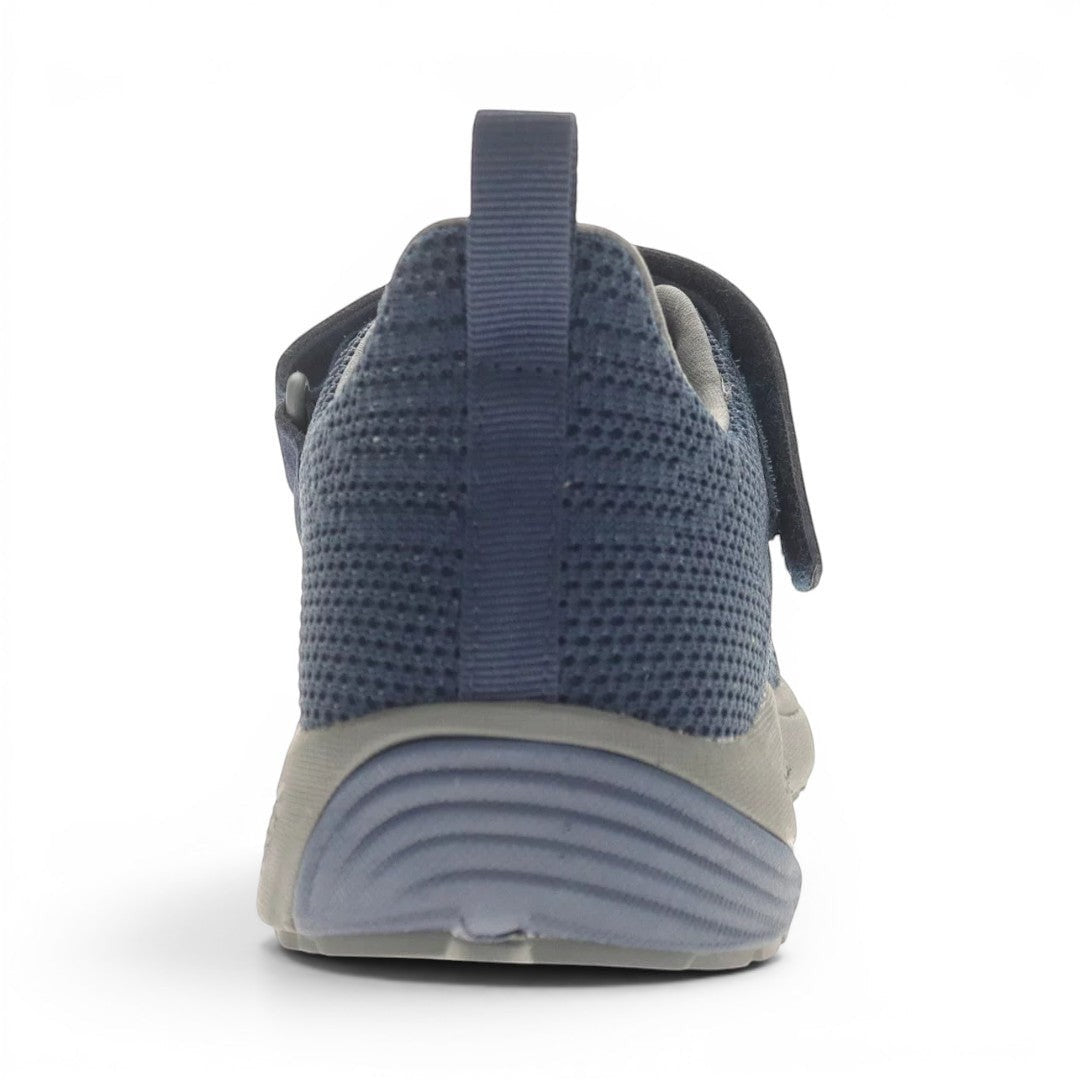 The Happy Shoe Shop Propet Men's Tour Knit FX navy blue knit sneakers with Velcro strap and pull tab.