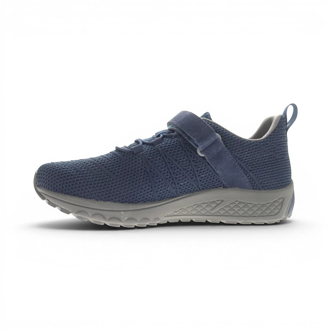 The Happy Shoe Shop Propet Mens Tour Knit FX navy blue mesh sneakers with adjustable strap and grey sole.