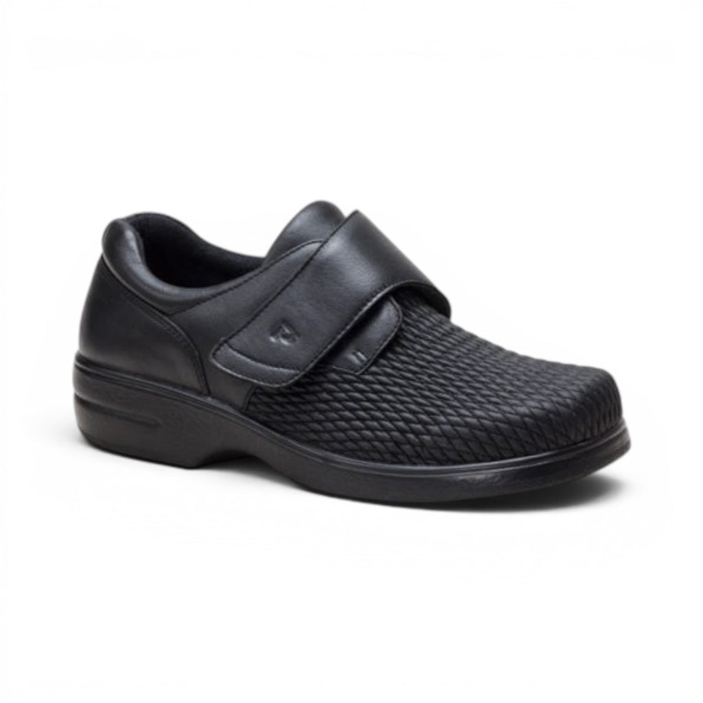 The Happy Shoe Shop Propet Olivia Stretch Shoe in black leather with adjustable velcro strap and textured toe box.