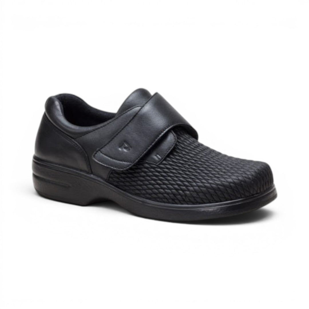 The Happy Shoe Shop Propet Olivia Stretch Shoe in black leather with adjustable velcro strap and textured toe box.