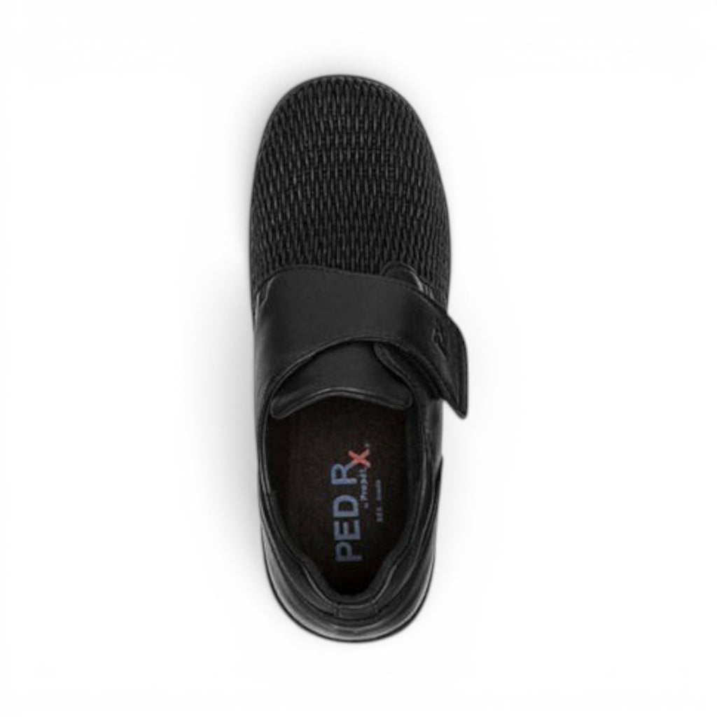 The Happy Shoe Shop Propet Olivia Stretch Shoe in black, featuring a mesh upper, adjustable velcro strap, and comfortable interior.