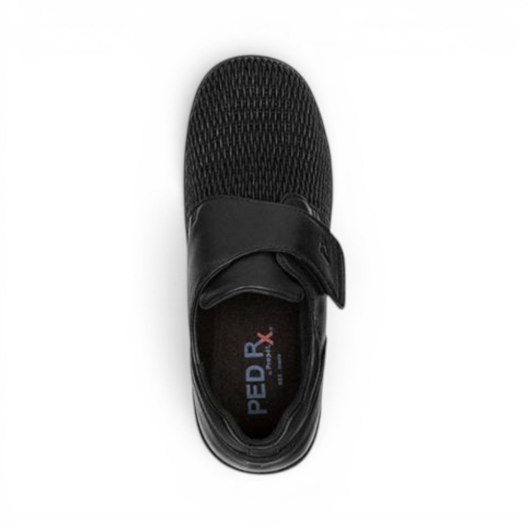 The Happy Shoe Shop Propet Olivia Stretch Shoe in black, featuring a mesh upper, adjustable velcro strap, and comfortable interior.