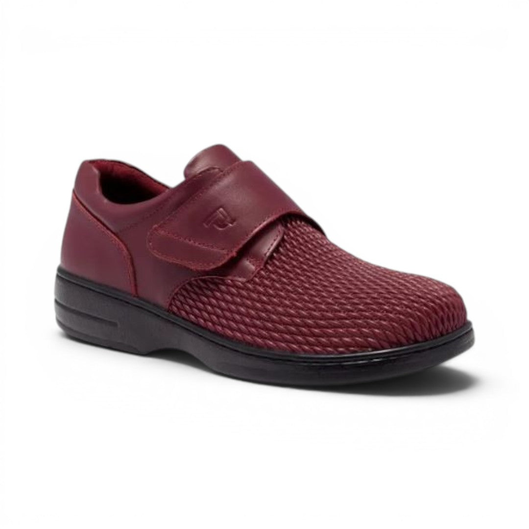 The Happy Shoe Shop Propet Olivia Stretch Shoe in burgundy leatherette with velcro strap and textured toe box.
