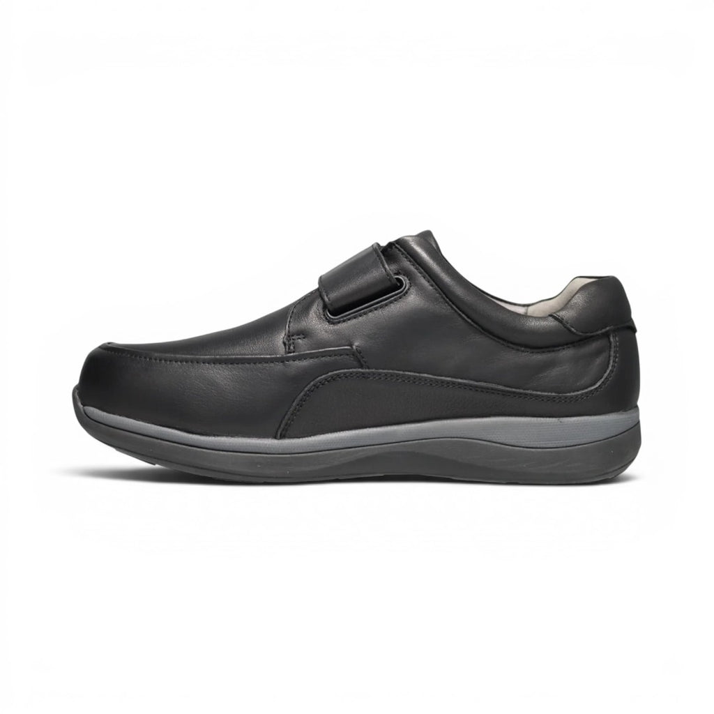 The Happy Shoe Shop Propet Parker men's black leather shoe with adjustable velcro strap and 3E width.