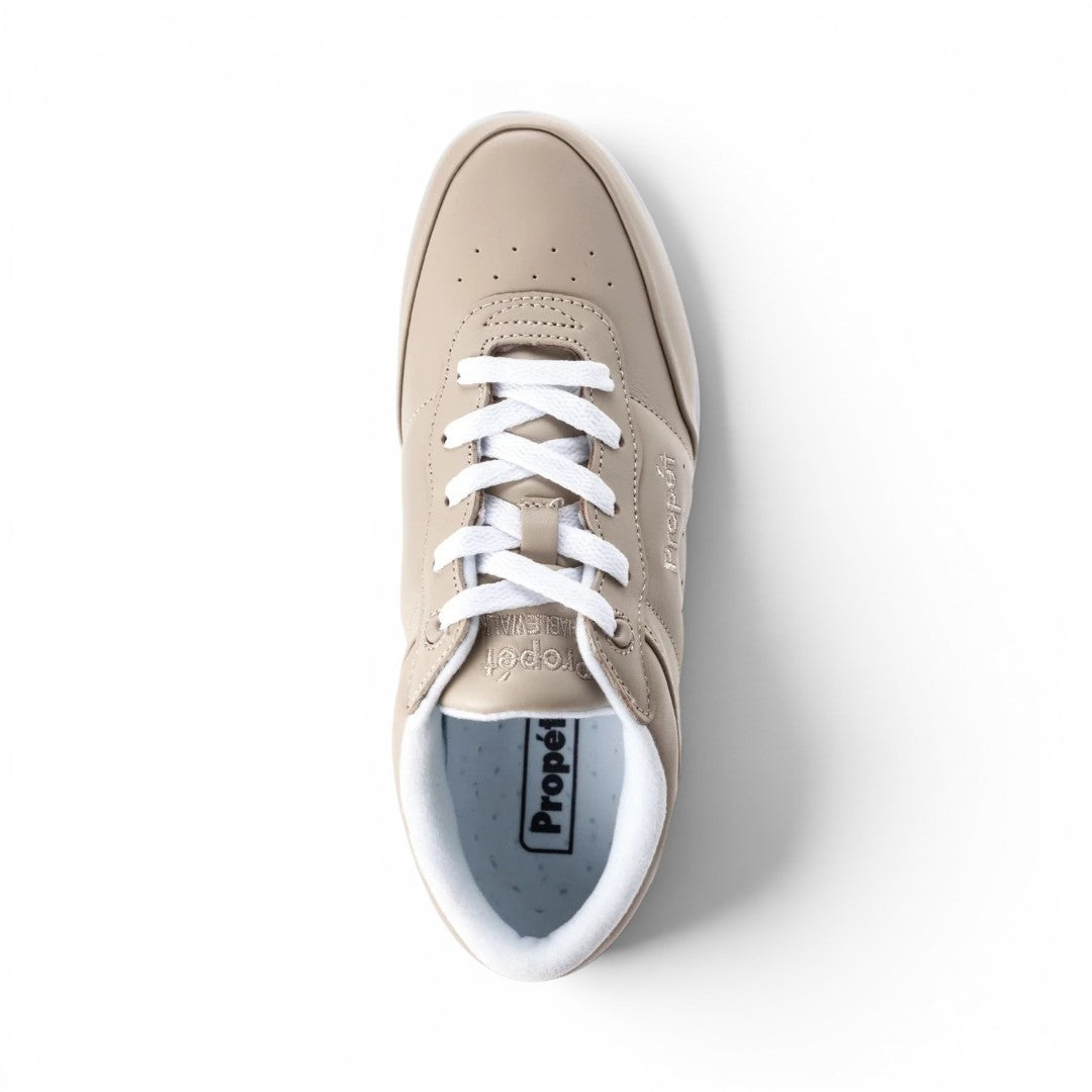 The Happy Shoe Shop Propet Washable Walker in black leather with white laces. Features a padded collar and removable insole.