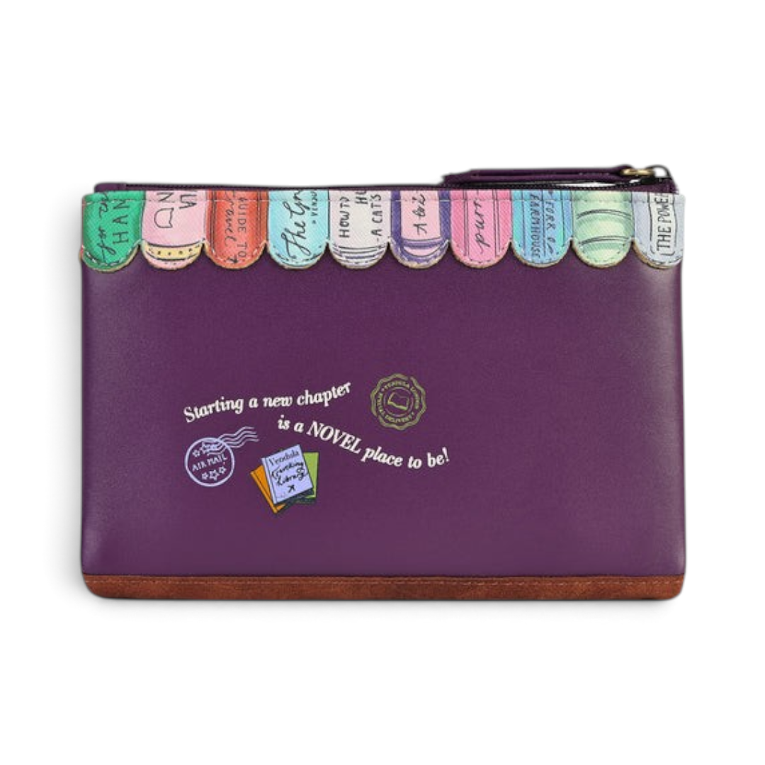 The Happy Shoe Shop Vendula London purple vegan leather coin purse with book-themed embossed details and zipper.