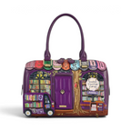 The Happy Shoe Shop Vendula London purple vegan leather bowler bag featuring a detailed bookshop scene and handles.