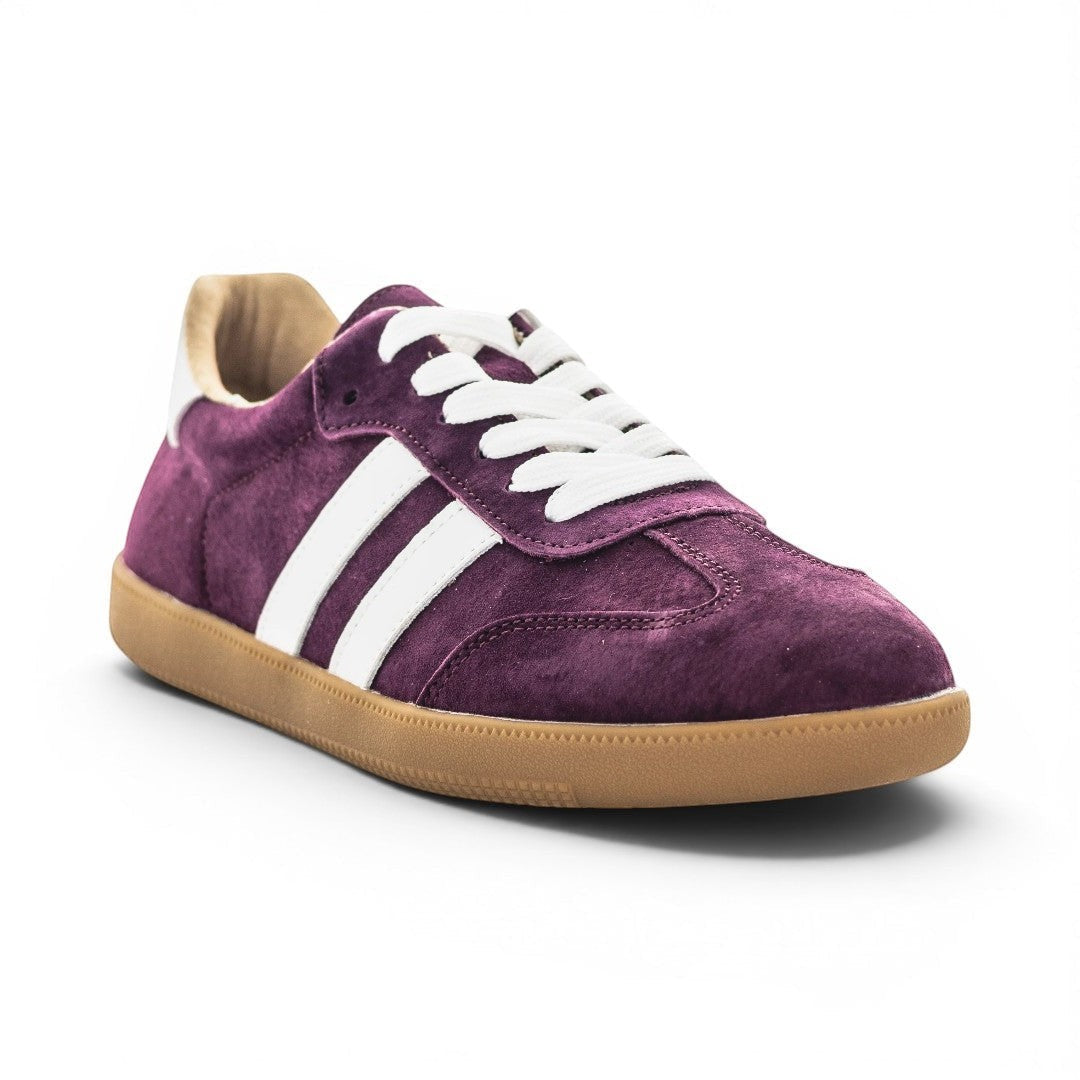 The Happy Shoe Shop Just Bee Crystal purple suede lace-up sneaker with white stripes and a gum rubber sole.