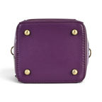 The Happy Shoe Shop Vendula London telephone box bag base featuring purple vegan leather and four gold metal feet.