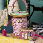 The Happy Shoe Shop Vendula London raspberry vegan leather sewing shop coin purse with embossed haberdashery details.