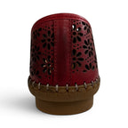 The Happy Shoe Shop Cabello Kylie red leather slip-on shoe with floral laser-cut detailing and a flexible rubber sole.