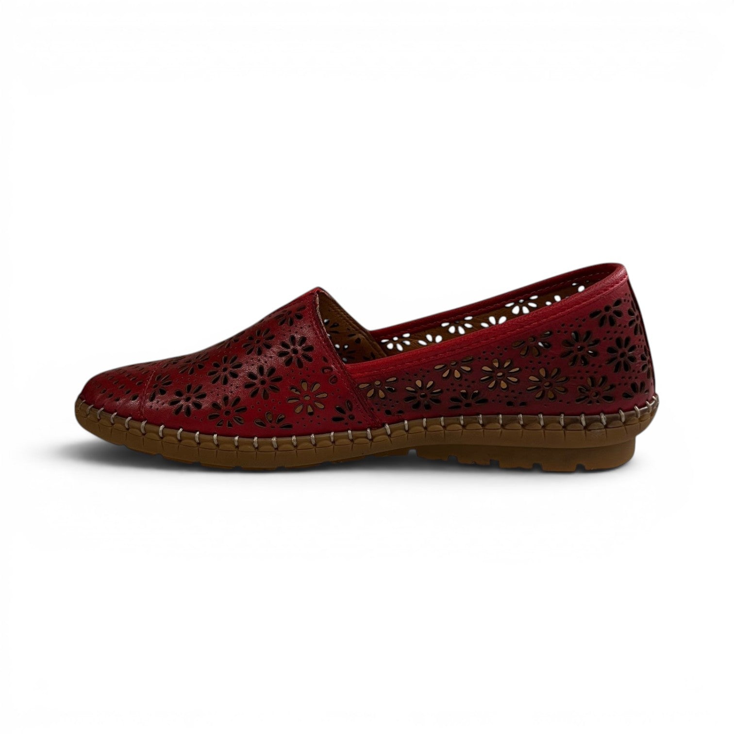 The Happy Shoe Shop Cabello Kylie red leather slip-on shoe with floral laser-cut perforations and rubber sole.