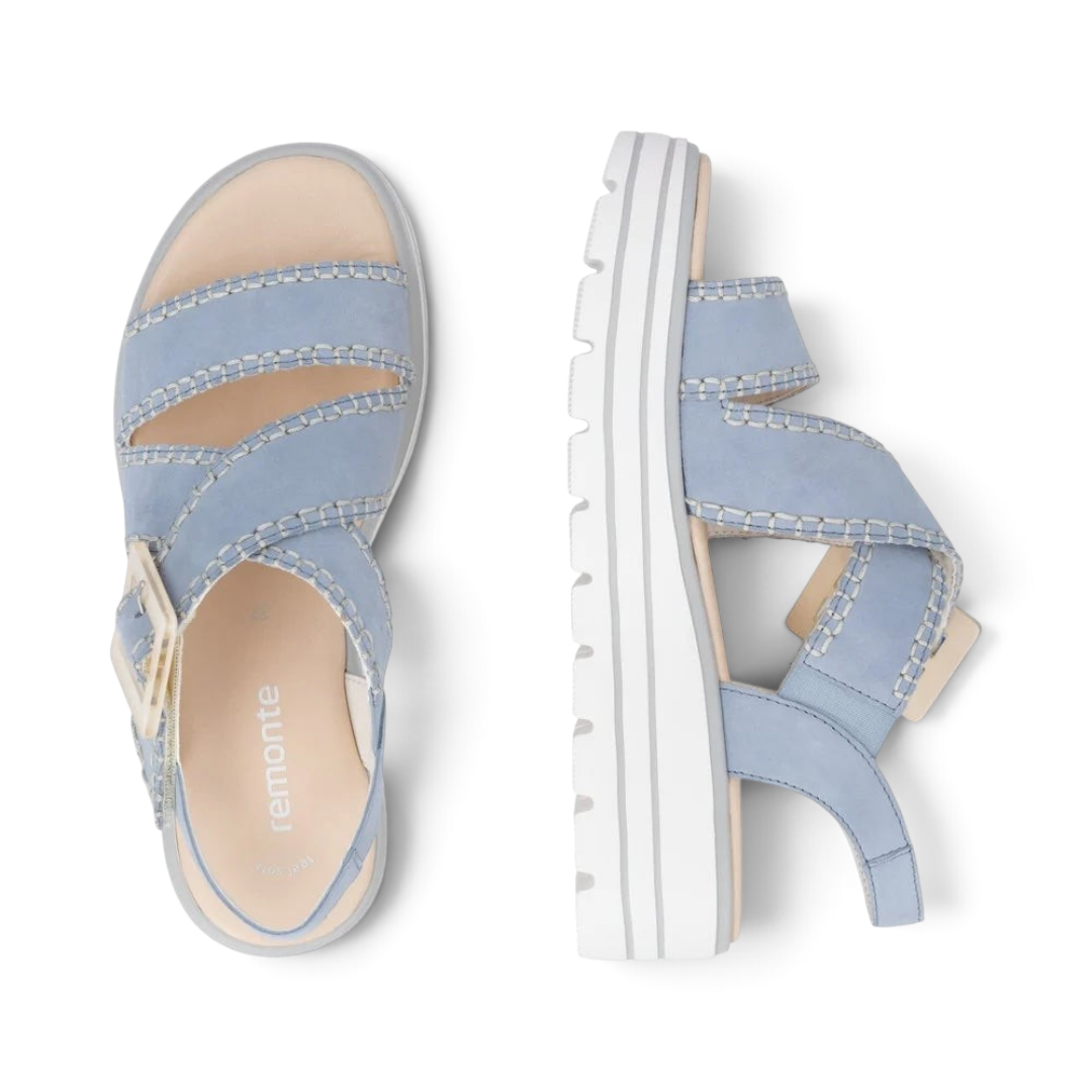 The Happy Shoe Shop Remonte D3N51 light blue suede wedge sandals with white platform soles and buckle detail.
