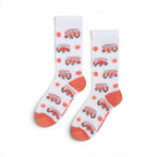 The Happy Shoe Shop White bamboo blend socks with retro orange combi van and flower pattern. Ribbed cuff and toe.