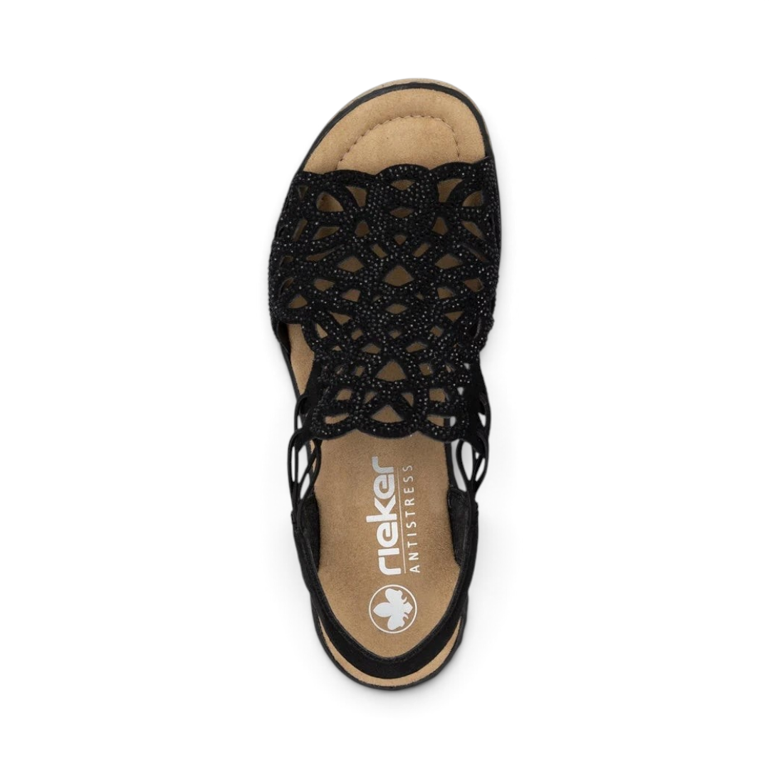 Top view of The Happy Shoe Shop Rieker 67465 black wedge sandal with intricate cut-out textile upper and cushioned sole