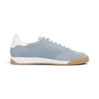 The Happy Shoe Shop Rieker blue textile sneakers with white laces and a gum rubber outsole, side view.
