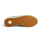 The Happy Shoe Shop Rieker blue textile sneaker showing the flexible brown rubber outsole with ribbed tread pattern