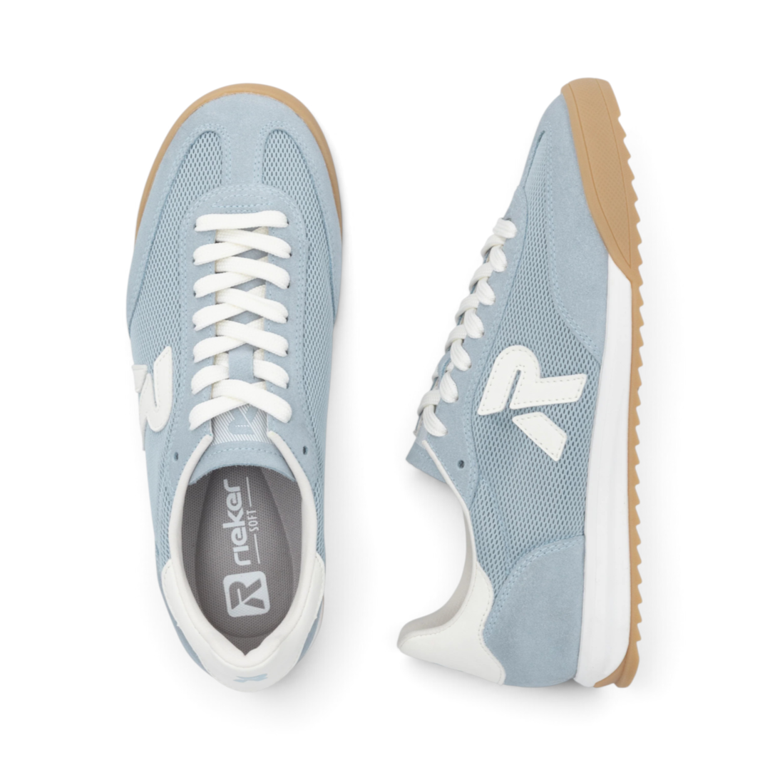 The Happy Shoe Shop Rieker blue textile sneakers with white laces, side logo, and gum rubber outsole for women.