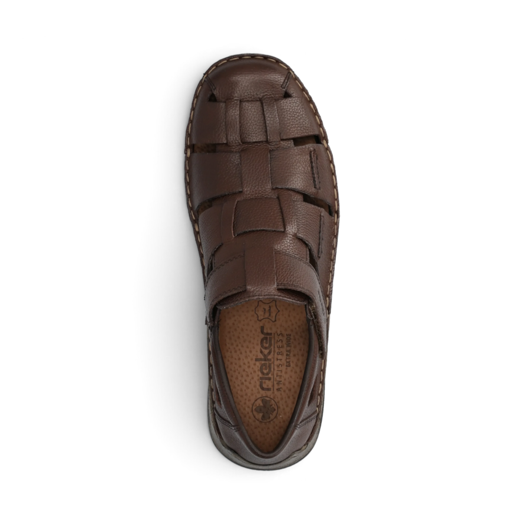 The Happy Shoe Shop Rieker brown leather fisherman sandals with wide fit and decorative cut-outs, top view.