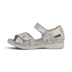 The Happy Shoe Shop Rieker V7474 multicolour floral suede closed-heel sandal with adjustable hook and loop strap.