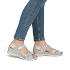 The Happy Shoe Shop Rieker V7474 multicolour floral suede closed-heel sandals with hook and loop strap on a model