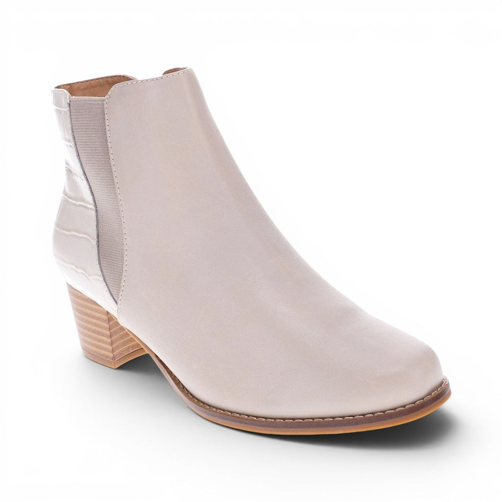 The Happy Shoe Shop Scholl Heaven Zip Boot: beige leather ankle boot with elasticated side panels and a croc-effect heel.