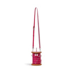 The Happy Shoe Shop Vendula London sewing box scrapbook reel bag in raspberry vegan leather with measuring tape strap.