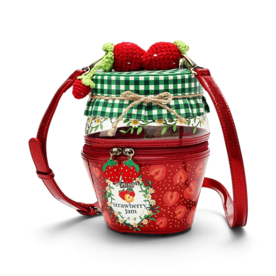 The Happy Shoe Shop Vendula London strawberry jam jar shaped vegan leather bag with 3D knitted strawberry accents.