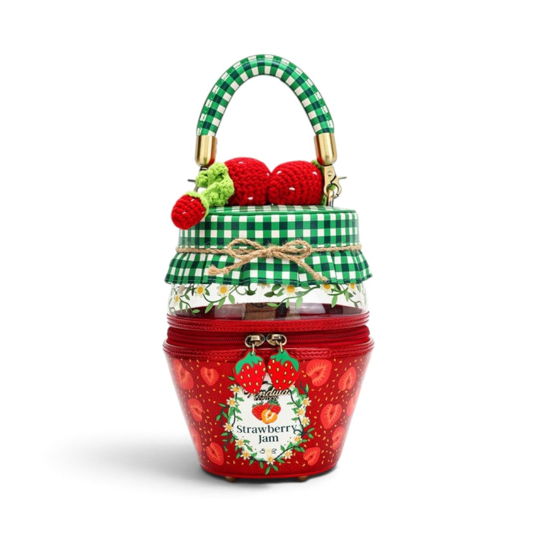 The Happy Shoe Shop Vendula London strawberry jam jar shaped vegan leather bag with 3D knitted strawberry accents.