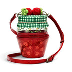 The Happy Shoe Shop Vendula London strawberry jam jar shaped vegan leather crossbody bag with 3D knitted strawberries.