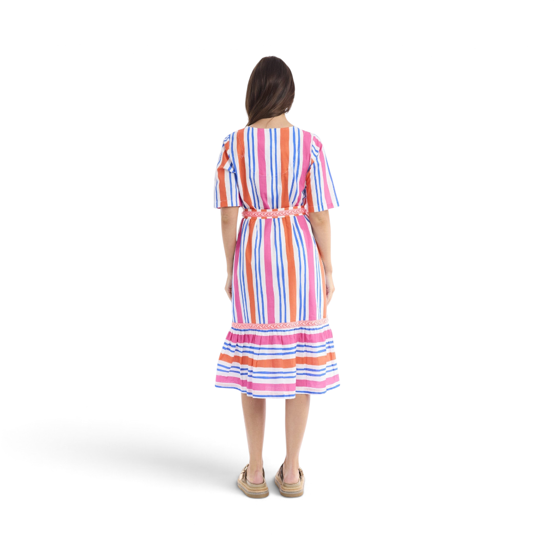Back view of a woman wearing an Orientique Escape multi-colour striped organic cotton midi dress from The Happy Shoe Shop