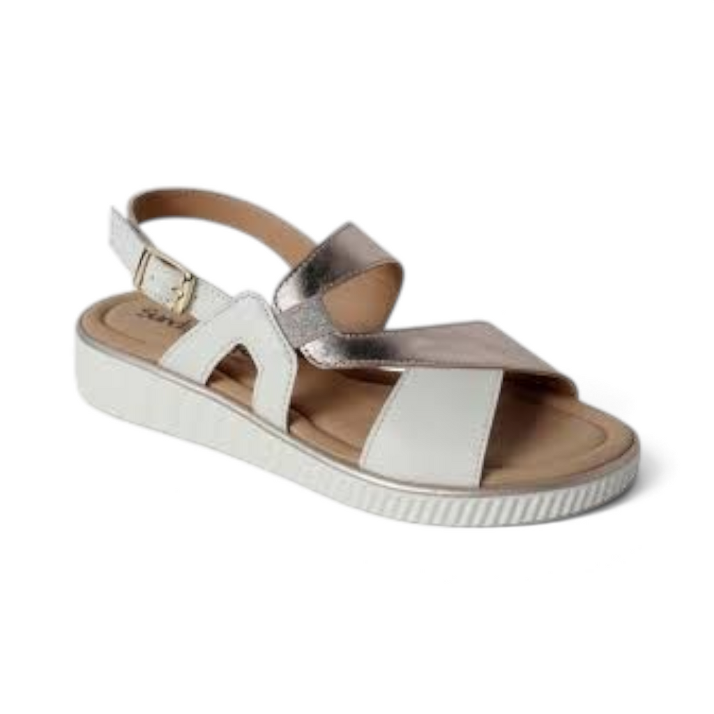 The Happy Shoe Shop Sundowner Satina sandal featuring white and metallic straps with an adjustable buckle closure.