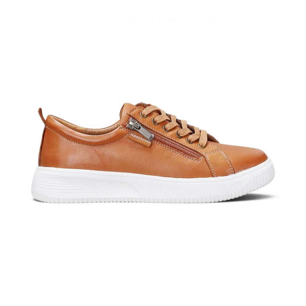 The Happy Shoe Shop Le Sansa Nelly tan leather sneakers with functional side zip, cord laces, and white platform sole.