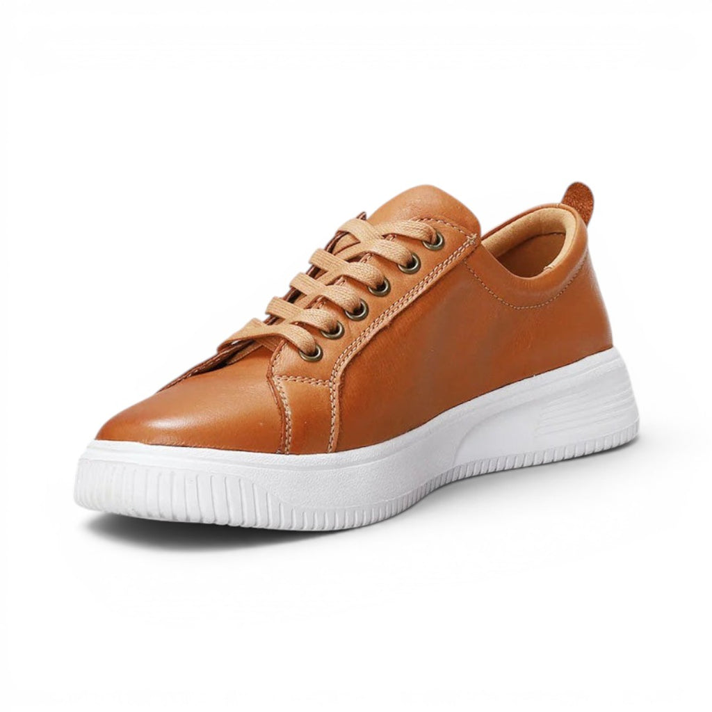 The Happy Shoe Shop Nelly tan leather sneakers with white platform midsole, lace-up front, and orthotic-friendly design.