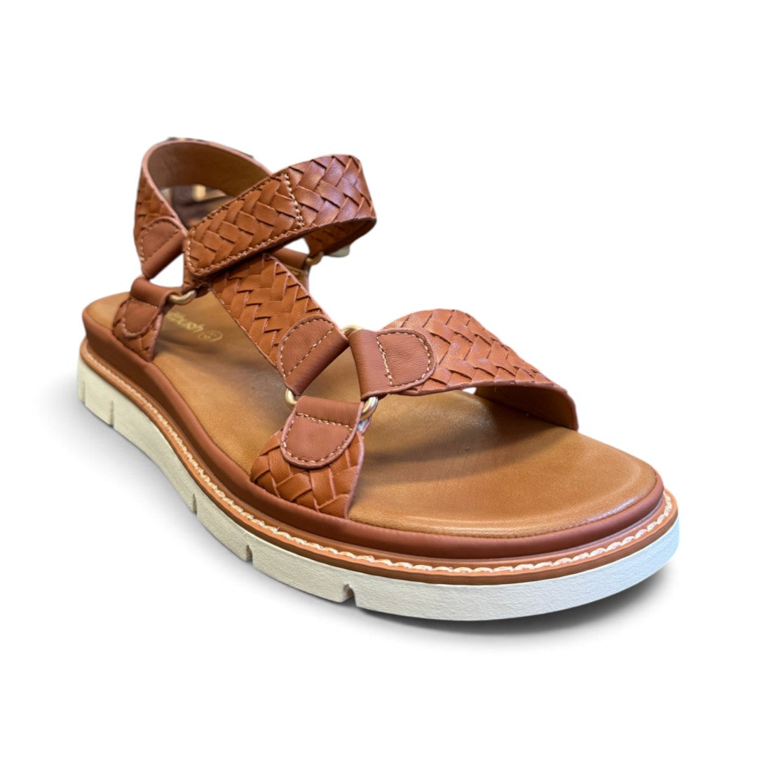 The Happy Shoe Shop Soultbush Harbour tan woven leather-look sandal with adjustable strap and white platform sole.