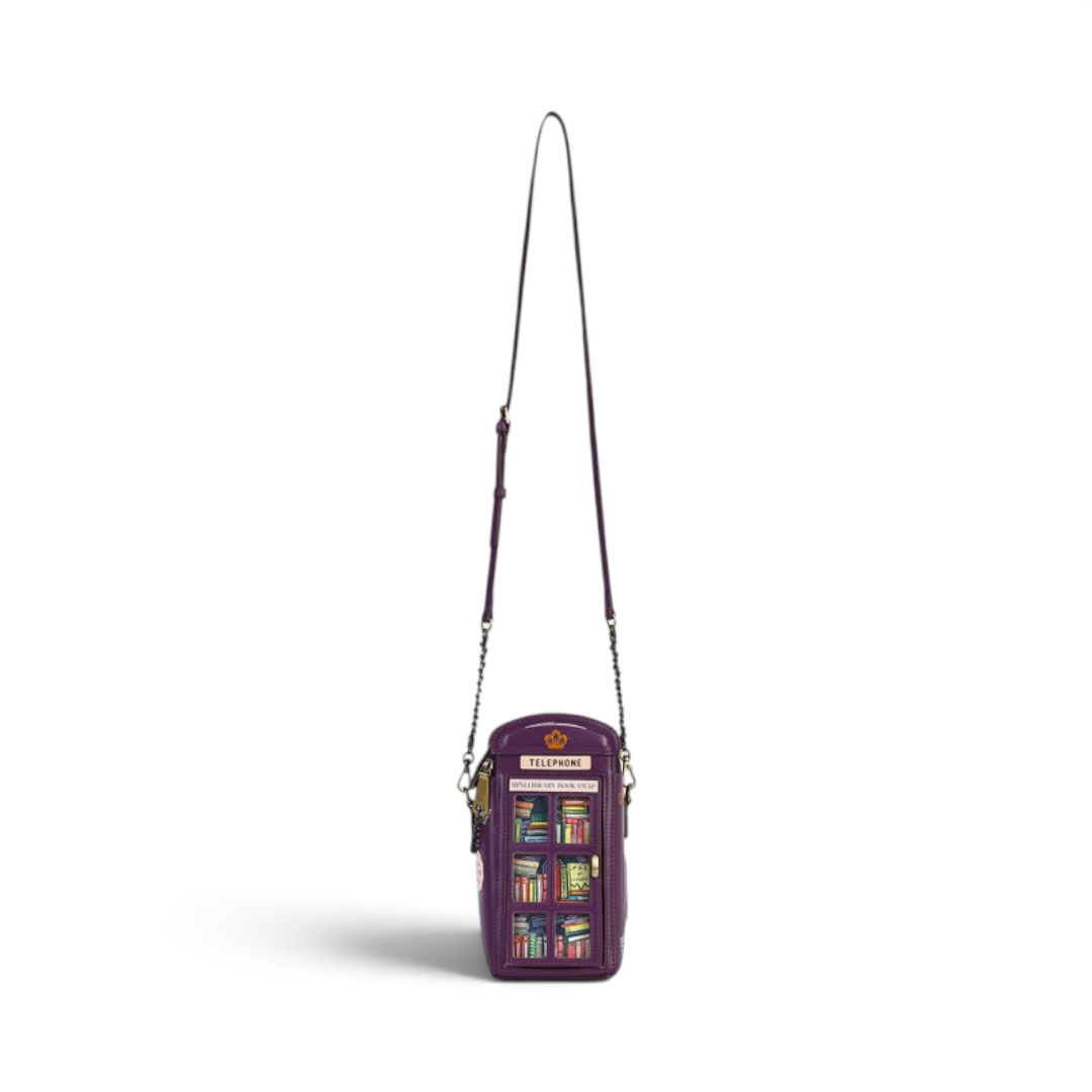 The Happy Shoe Shop Vendula London telephone box novelty bag in purple vegan leather with bookshop print and strap.