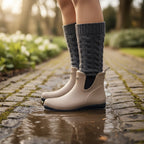 The Happy Shoe Shop Thomas Cook Wynyard beige rubber rain boots with faux fur lining and pull-on loop.