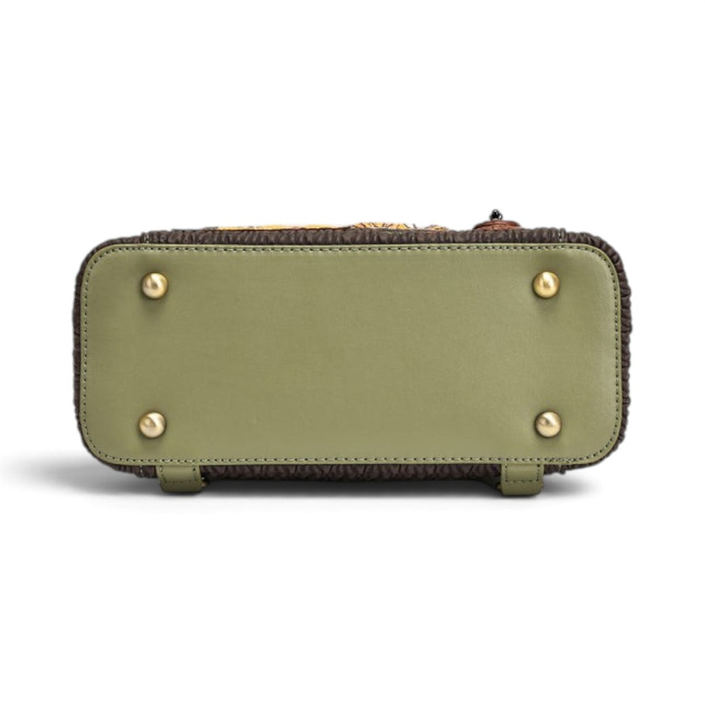 The Happy Shoe Shop Vendula London Lyla backpack base in olive green vegan leather with four protective metal feet.
