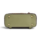 The Happy Shoe Shop Vendula London Lyla backpack base in olive green vegan leather with four protective metal feet.