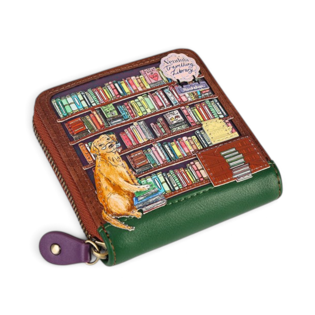 The Happy Shoe Shop Vendula London square wallet featuring a whimsical bookshop print with a dog on vegan leather.