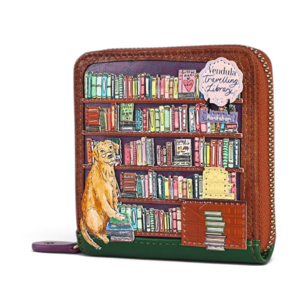 The Happy Shoe Shop Vendula London square wallet featuring a whimsical bookshop print with a dog and zip closure.
